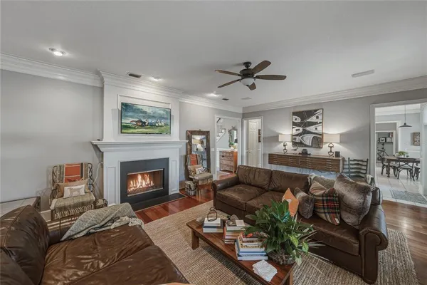 a kitchen with granite countertop a sink stainless steel appliances and cabinets