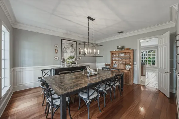 a kitchen with a table and chairs in it