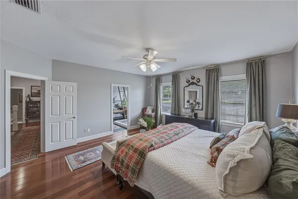 a bathroom with a toilet a sink and a mirror