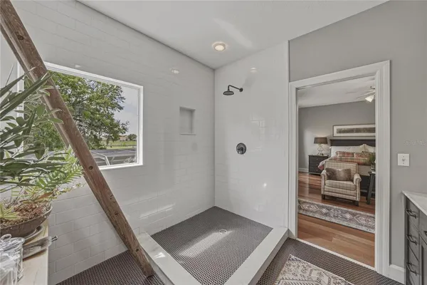 a view of a swimming pool with a patio