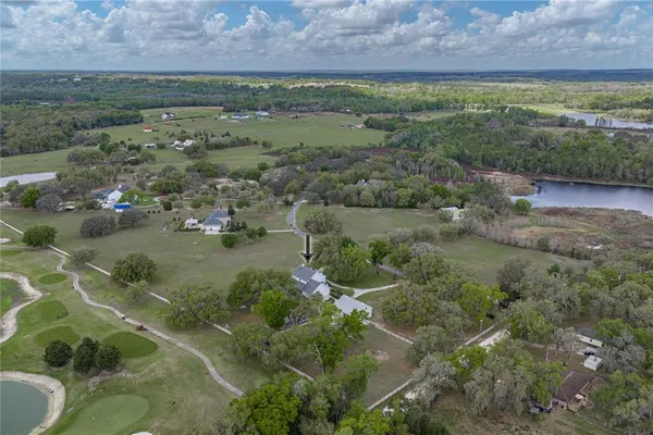 a park view with a fountain and garden