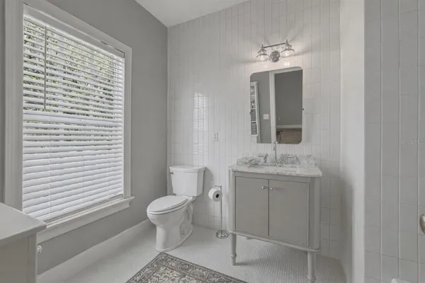 a view of a yard with wooden floor and a lake view