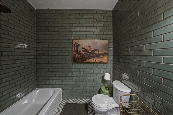 a view of a tree in a yard