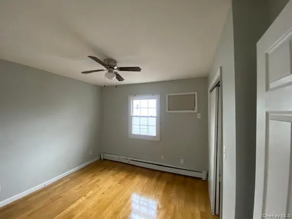 a view of an empty room and window