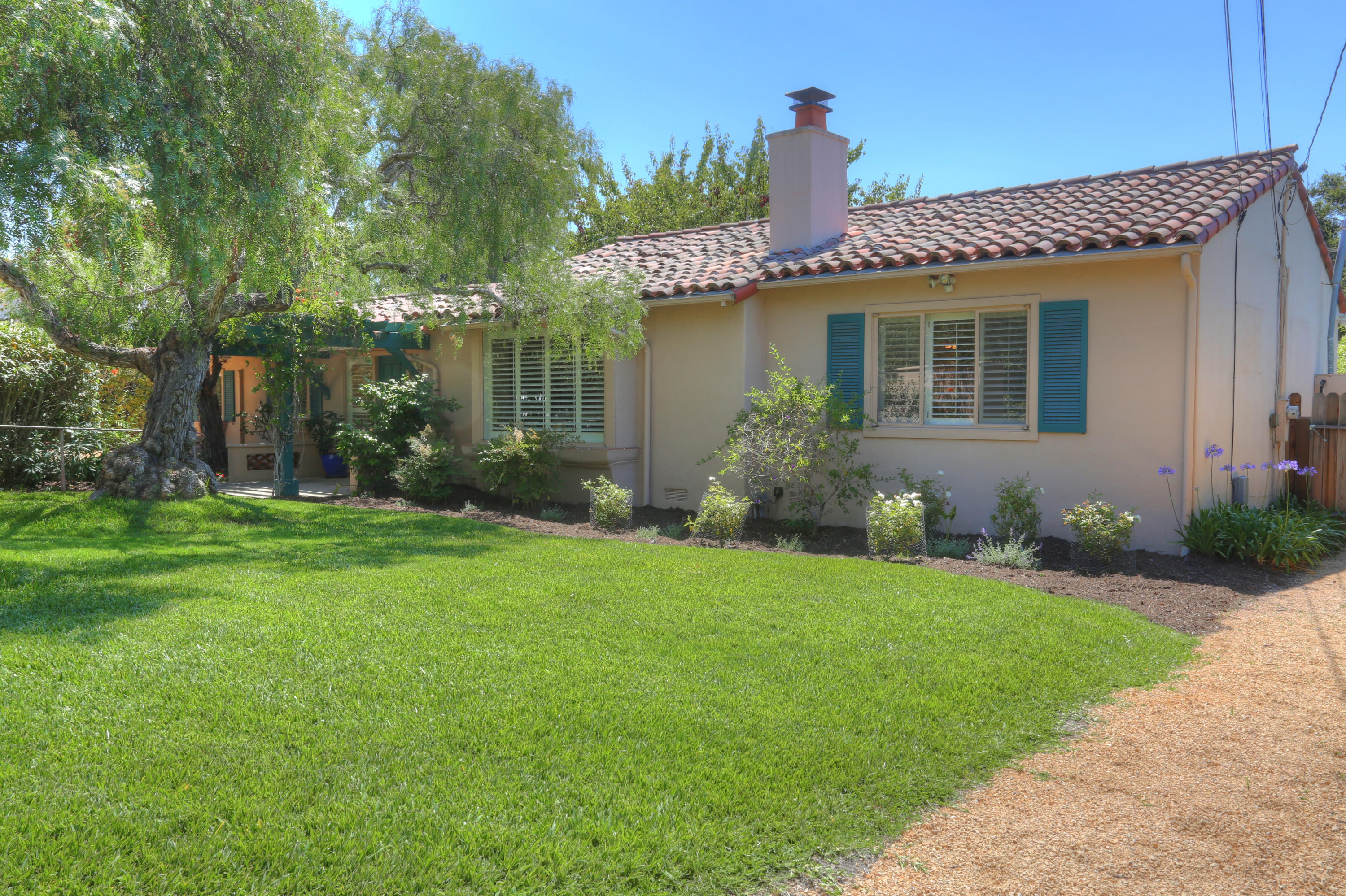 232 Hot Springs Road Santa Barbara, CA 93108 - Photo 1 of 1 a front view of a house with garden
