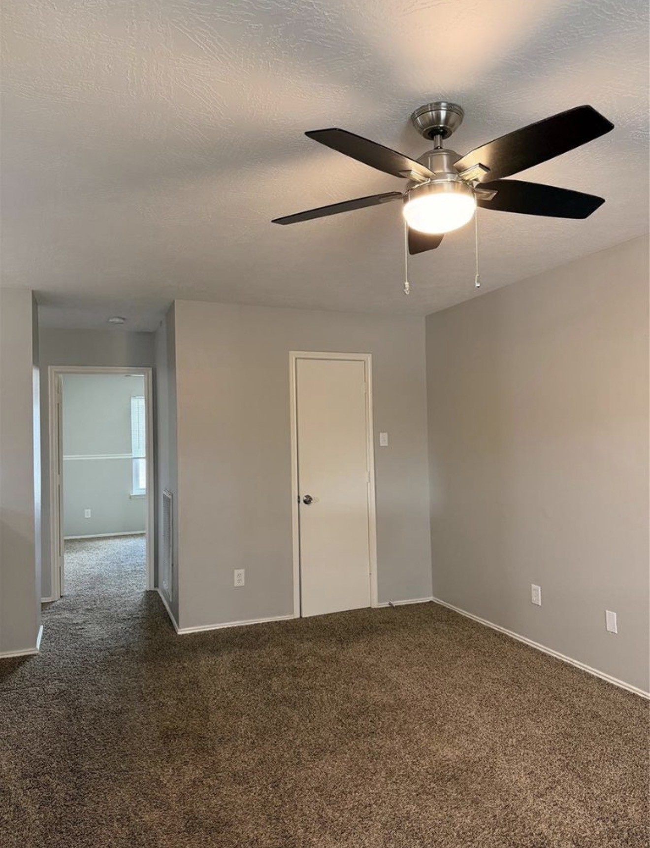 4707 East Parma Drive Rosenberg, TX 77471 - Photo 16 of 22 en empty room with fan and fan