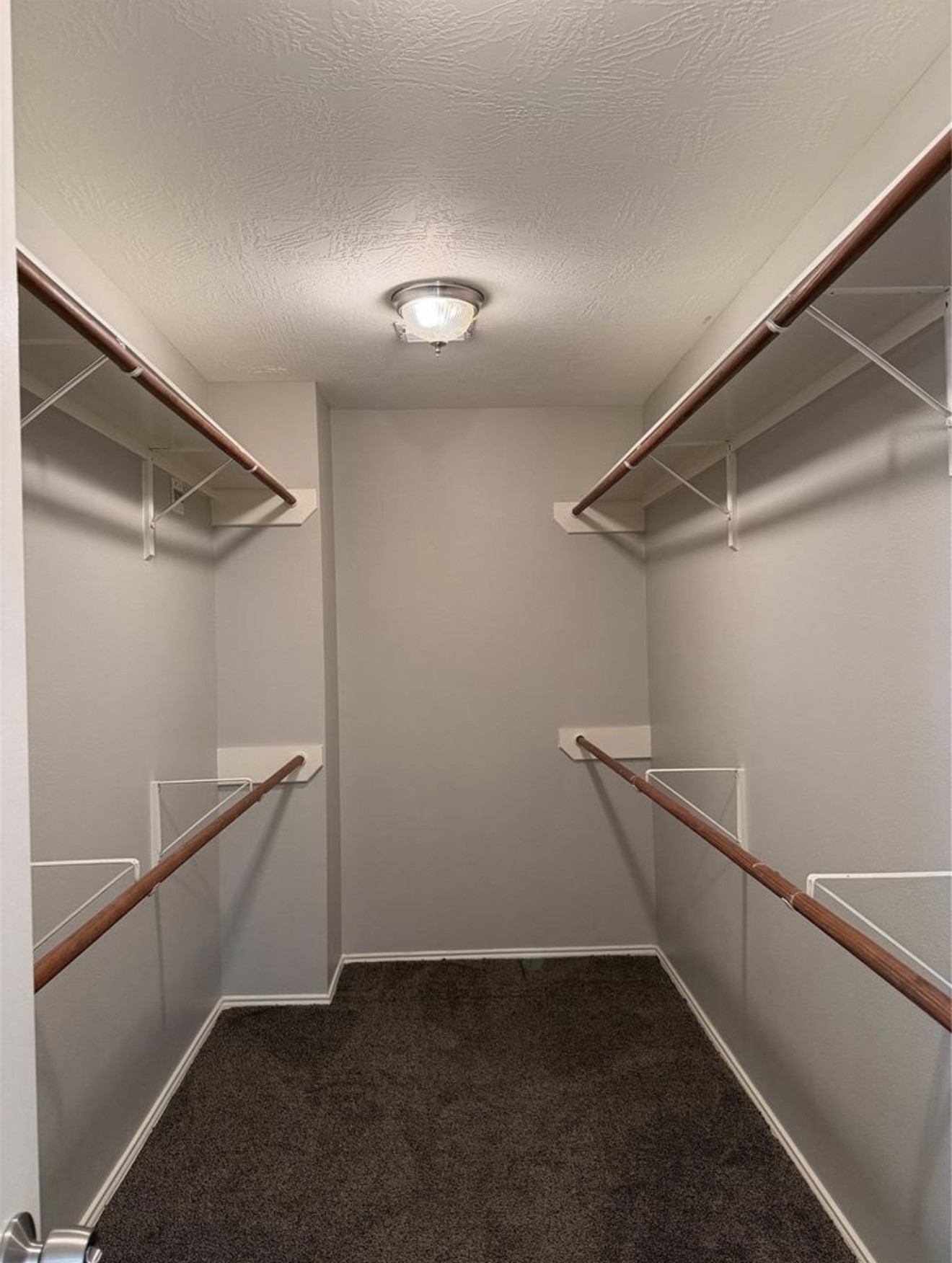 4707 East Parma Drive Rosenberg, TX 77471 - Photo 19 of 22 a view of an empty walk in closet