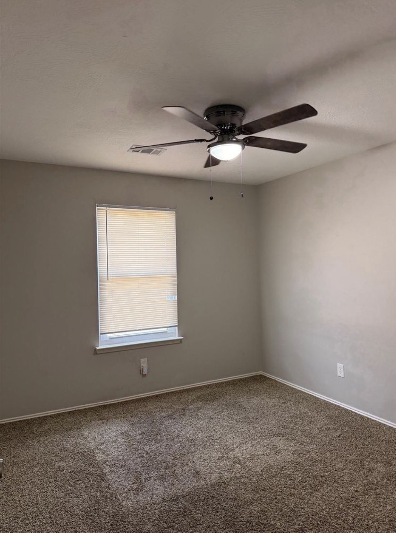 4707 East Parma Drive Rosenberg, TX 77471 - Photo 21 of 22 an empty room with a window