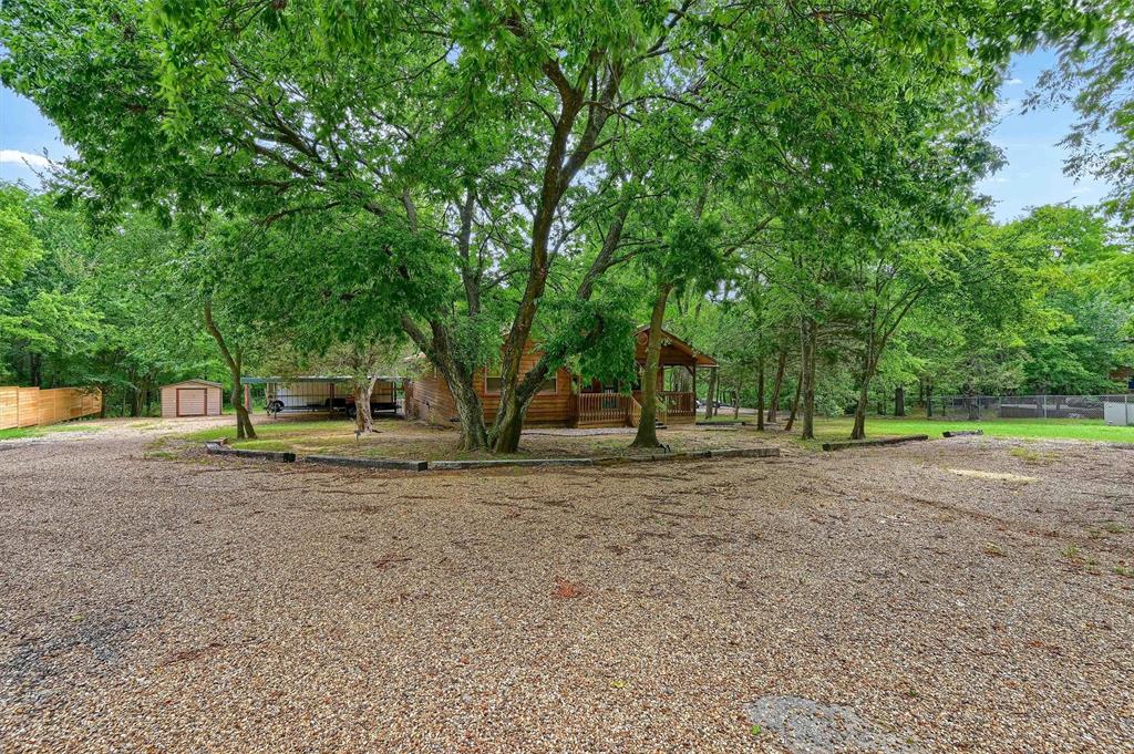 2003 Flowing Wells Road Pottsboro, TX 75076 - Photo 3 of 39 View of yard featuring a gazebo and a storage shed