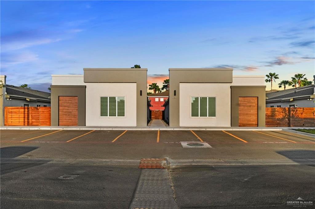 600 Brito Lane, Unit 3 Weslaco, TX 78599 - Photo 1 of 1 front view of a brick house with a road