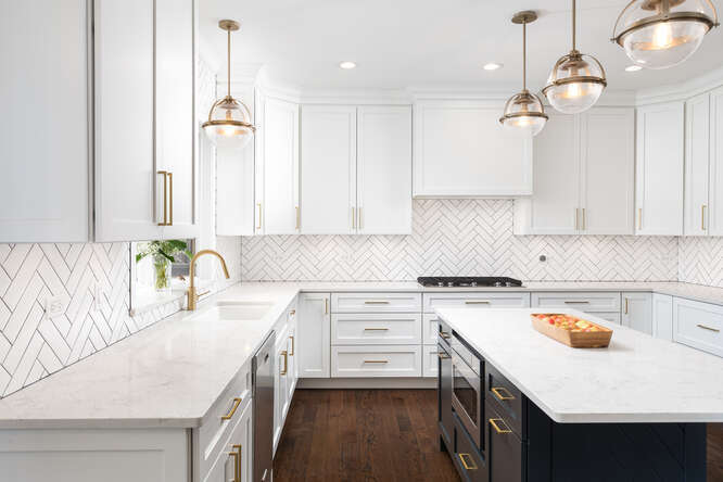 1530 White Eagle Drive Naperville, IL 60564 - Photo 11 of 43 a kitchen with a sink a stove and cabinets