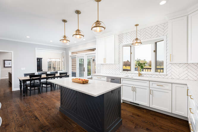 1530 White Eagle Drive Naperville, IL 60564 - Photo 13 of 43 a open kitchen with stainless steel appliances granite countertop a sink stove and wooden floor