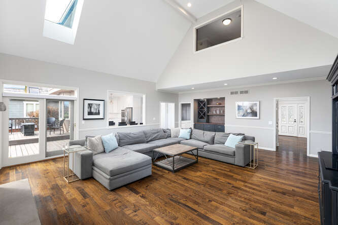 1530 White Eagle Drive Naperville, IL 60564 - Photo 19 of 43 a living room with furniture and a wooden floor