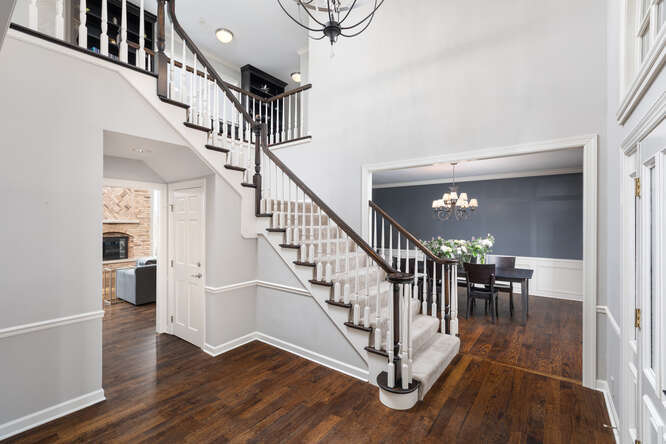 1530 White Eagle Drive Naperville, IL 60564 - Photo 2 of 43 a view of entryway and hall with wooden floor
