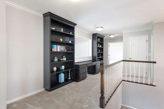 1530 White Eagle Drive Naperville, IL 60564 - Photo 21 of 43 a view of a hallway with seating area