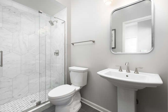 1530 White Eagle Drive Naperville, IL 60564 - Photo 33 of 43 a bathroom with a sink toilet and shower