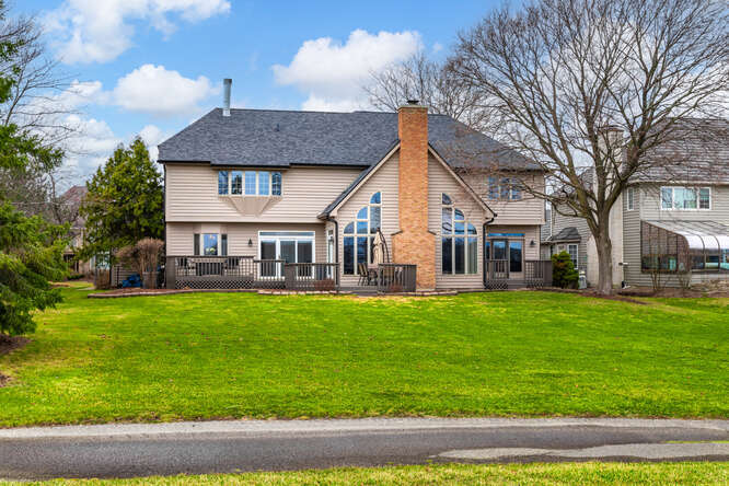 1530 White Eagle Drive Naperville, IL 60564 - Photo 36 of 43 a view of a house with a big yard plants and large trees
