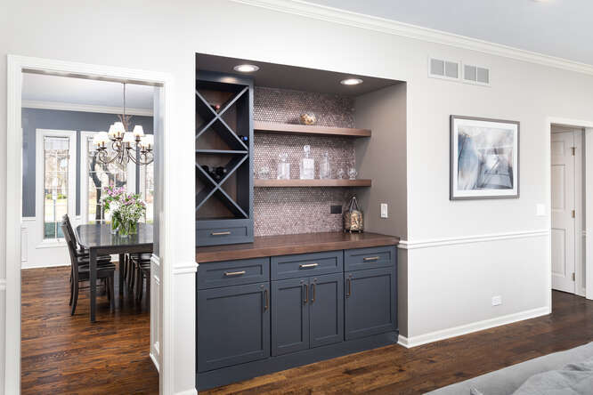 1530 White Eagle Drive Naperville, IL 60564 - Photo 5 of 43 a kitchen with a wooden floor and a refrigerator