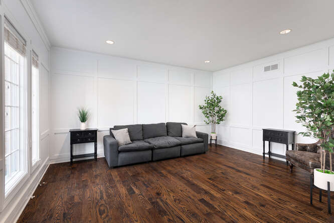 1530 White Eagle Drive Naperville, IL 60564 - Photo 6 of 43 a living room with furniture and a potted plant