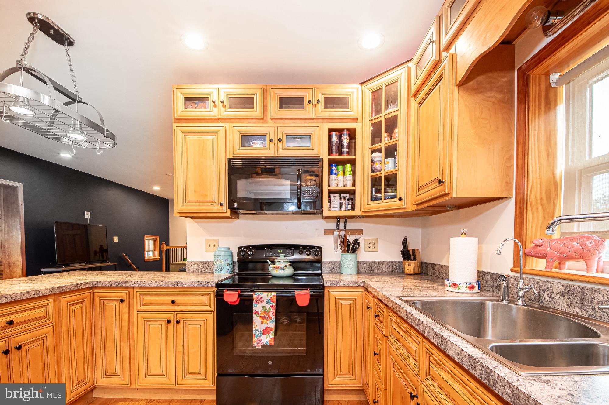 2180 Strasburg Road Front Royal, VA 22630 - Photo 34 of 90 a kitchen with stainless steel appliances granite countertop a sink and cabinets