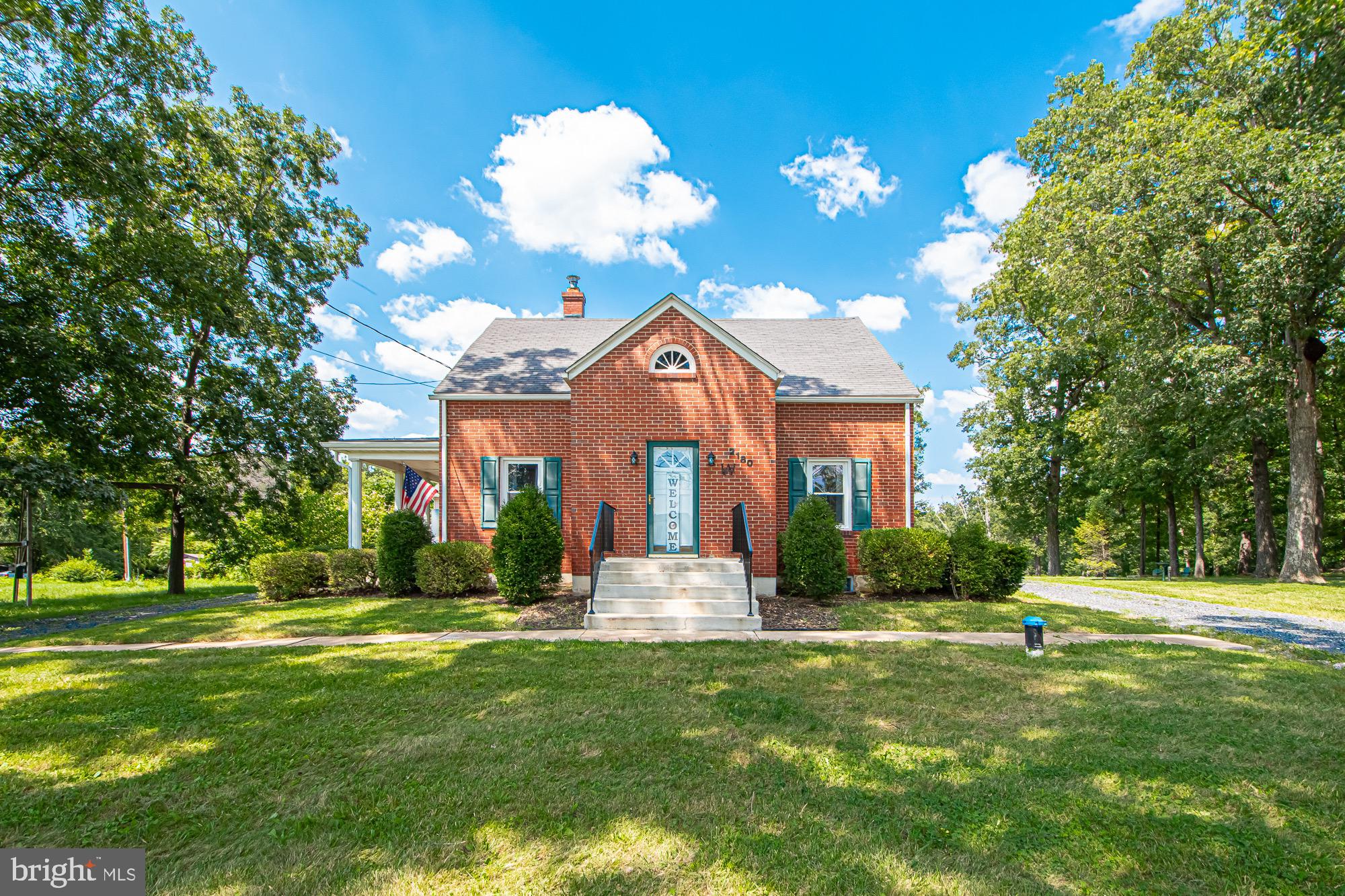 2180 Strasburg Road Front Royal, VA 22630 - Photo 5 of 90 a front view of a house with a yard