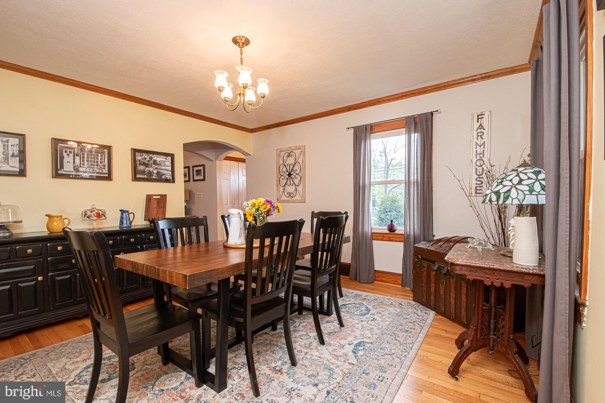 2180 Strasburg Road Front Royal, VA 22630 - Photo 54 of 90 a view of a dining room with furniture window and wooden floor