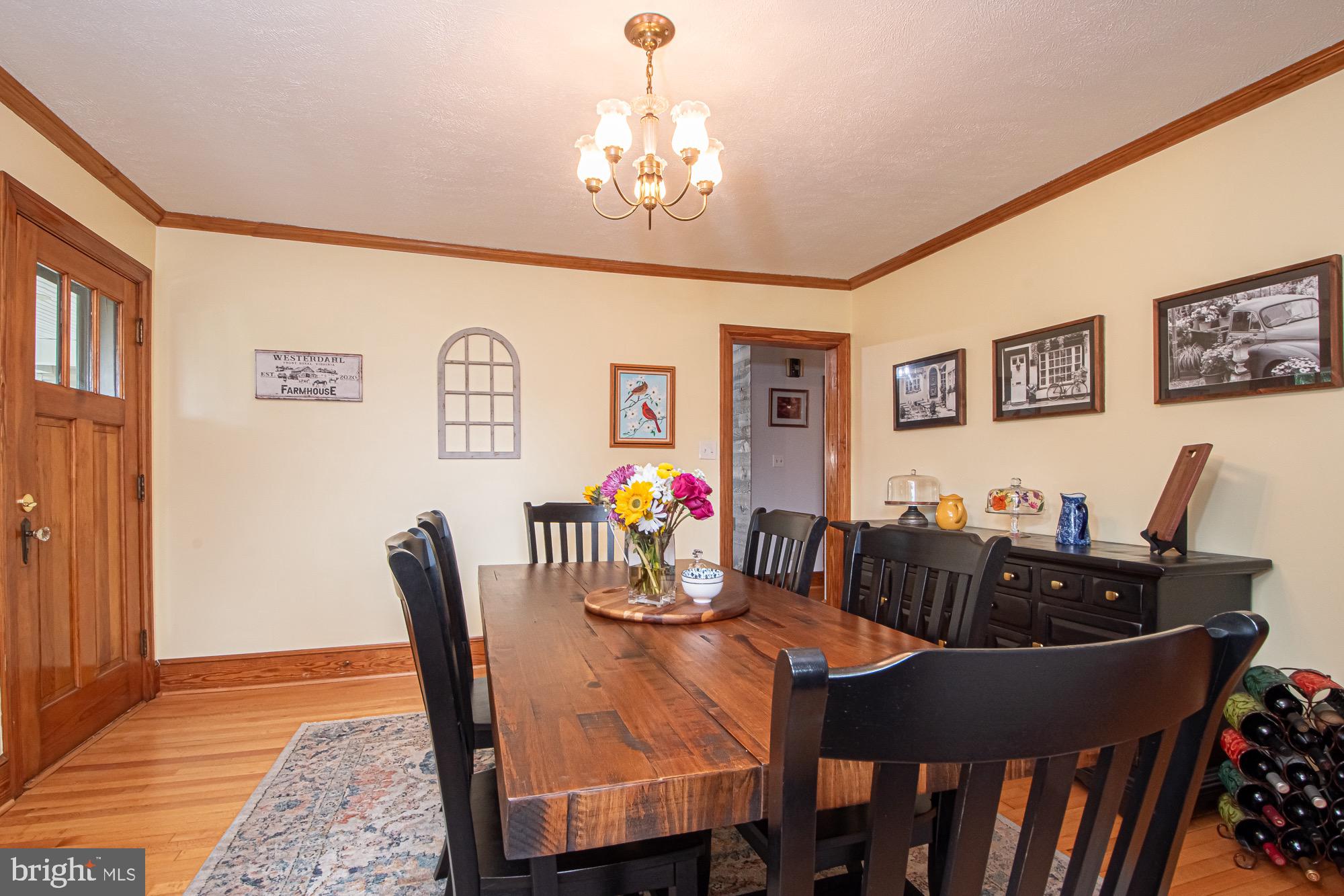 2180 Strasburg Road Front Royal, VA 22630 - Photo 55 of 90 a view of a dining room with furniture and wooden floor