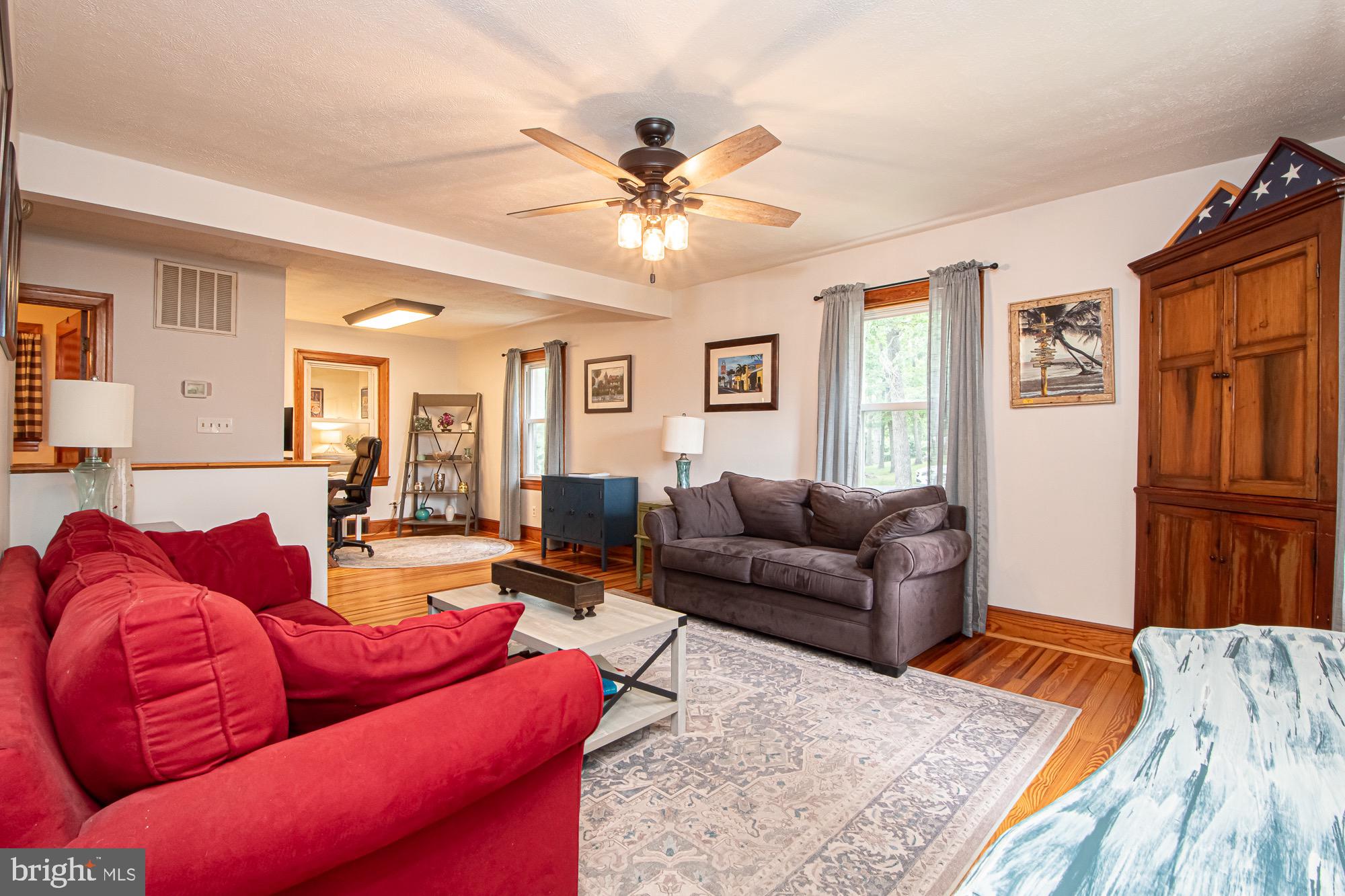 2180 Strasburg Road Front Royal, VA 22630 - Photo 57 of 90 a living room with furniture and a rug