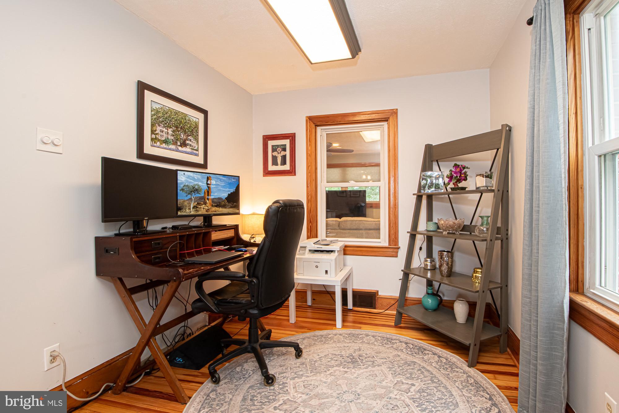 2180 Strasburg Road Front Royal, VA 22630 - Photo 61 of 90 a view of a workspace with furniture and a window