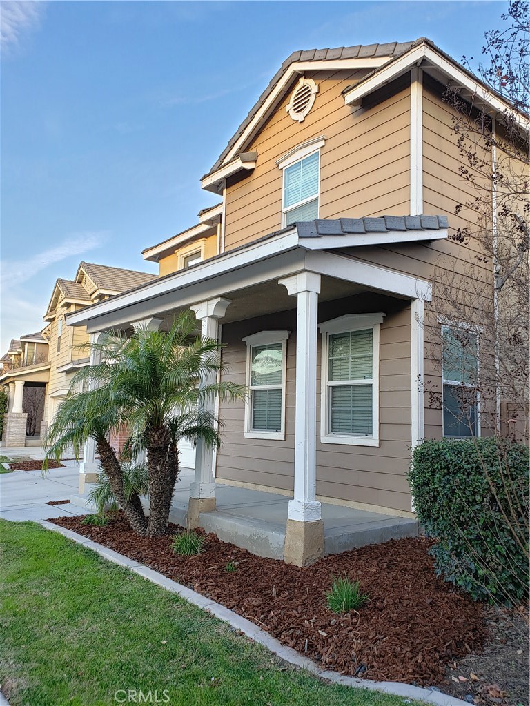1670 Edmon Way Riverside, CA 92501 - Photo 1 of 1 a front view of a house with garden