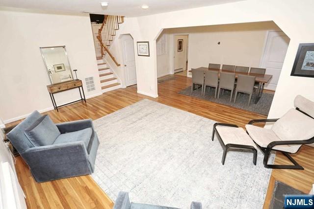 84 12th Street Cresskill, NJ 07626 - Photo 10 of 45 a living room with furniture and a dining table