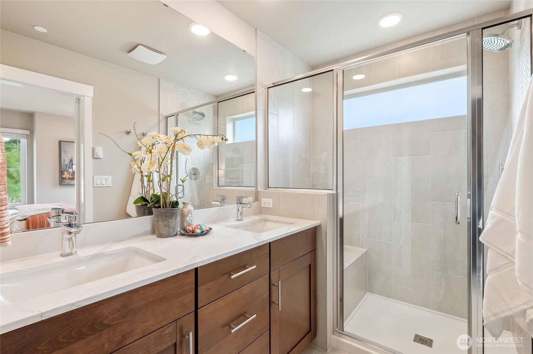 1322 194th Street Southeast, Unit D6 Bothell, WA 98012 - Photo 12 of 18 a bathroom with a shower sink vanity granite and mirror