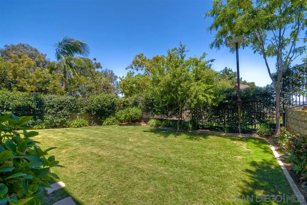 1728 Yucca Road Oceanside, CA 92054 - Photo 21 of 25 a view of a garden with a bench
