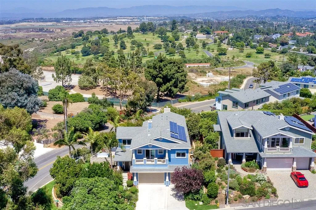 1728 Yucca Road Oceanside, CA 92054 - Photo 25 of 25 an aerial view of multiple houses with a street