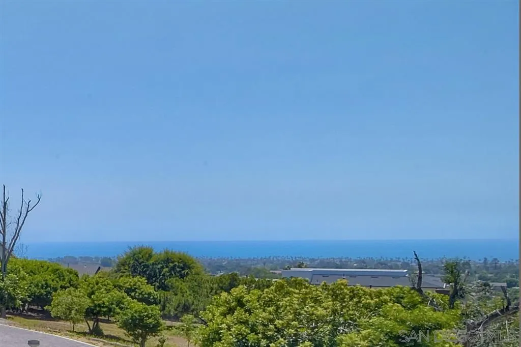 1728 Yucca Road Oceanside, CA 92054 - Photo 6 of 25 an aerial view of a city and mountain