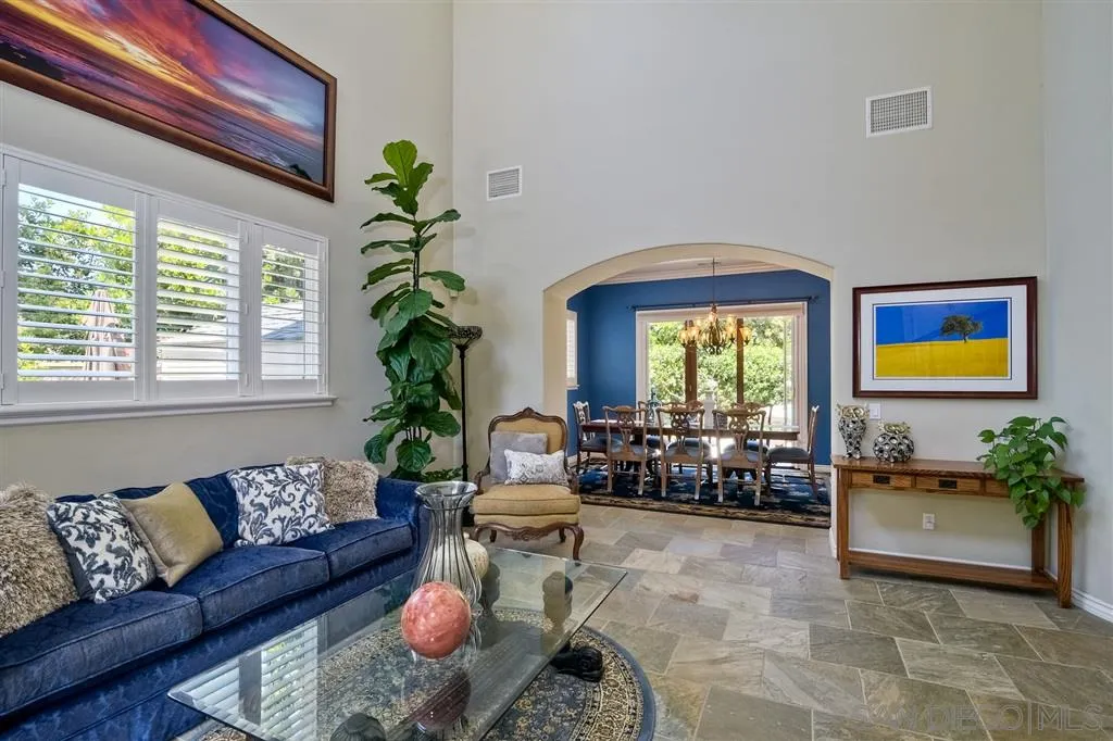 1728 Yucca Road Oceanside, CA 92054 - Photo 7 of 25 a living room with furniture and a large window