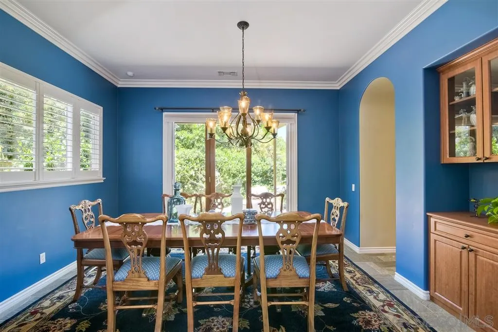 1728 Yucca Road Oceanside, CA 92054 - Photo 8 of 25 a view of a dining room with furniture window and outside view