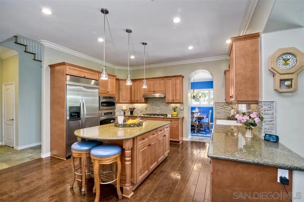 1728 Yucca Road Oceanside, CA 92054 - Photo 10 of 25 a kitchen with sink stove and refrigerator