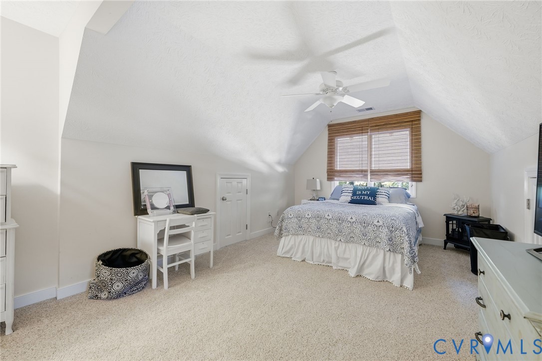 210 Riverview Road Stevensville, VA 23161 - Photo 43 of 63 Carpeted room featuring a sloped ceiling, window w