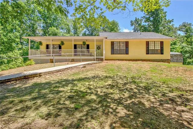 a house with yard in front of it