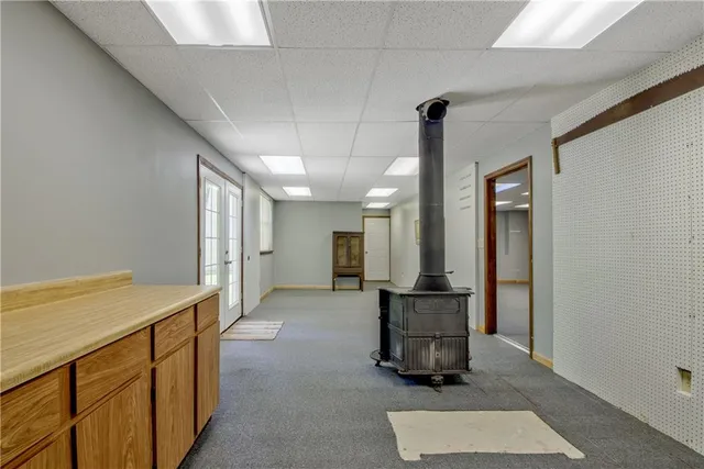 a view of livingroom with furniture and floor to ceiling window