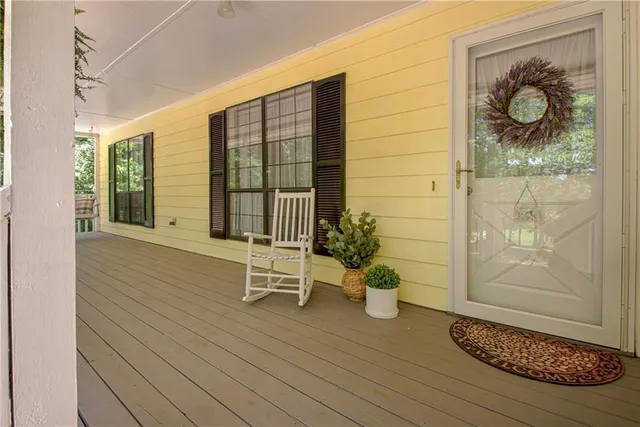 a living room with furniture and a gate