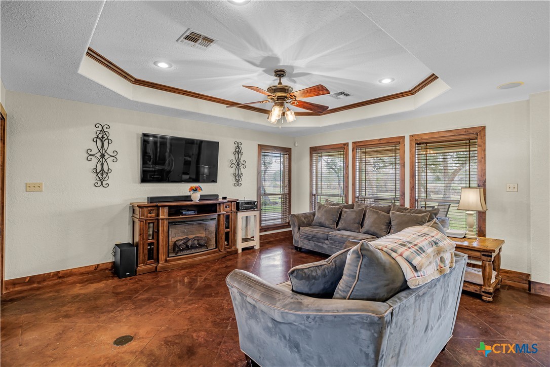 759 Richter Road Inez, TX 77968 - Photo 22 of 48 a living room with furniture and a flat screen tv