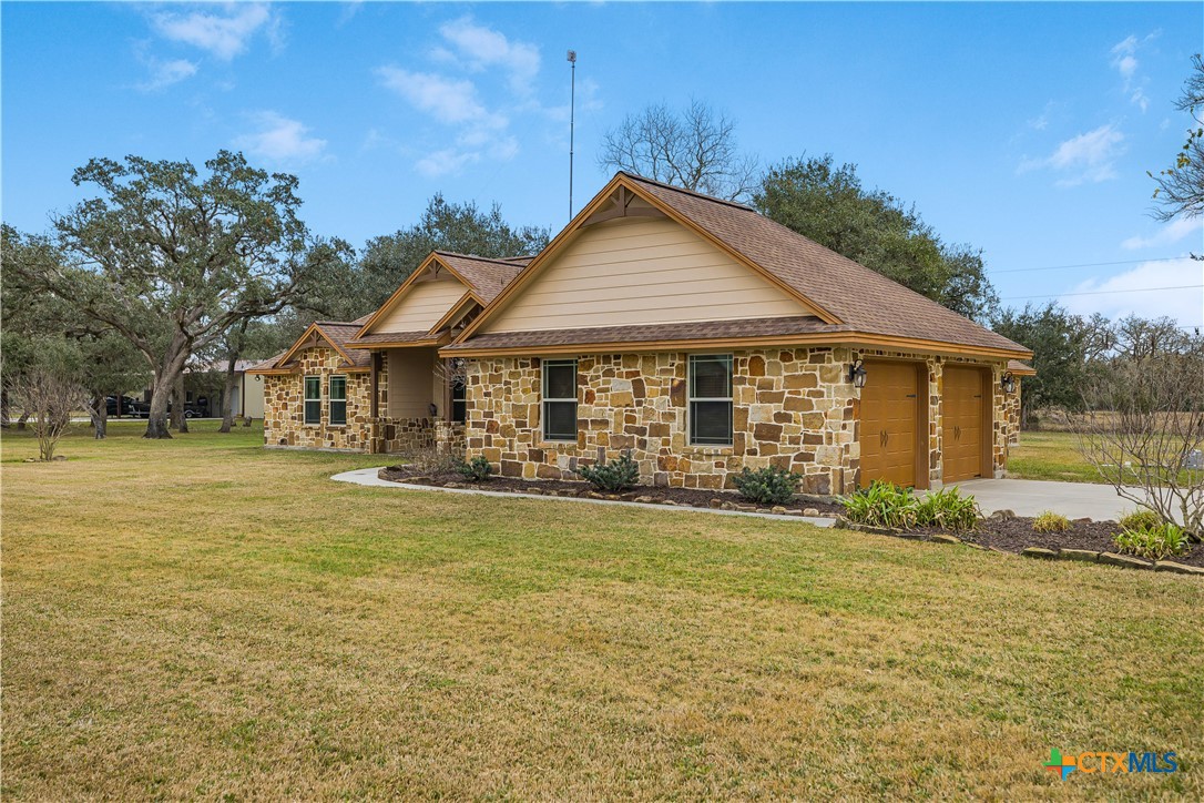 759 Richter Road Inez, TX 77968 - Photo 5 of 48 a front view of a house with a yard