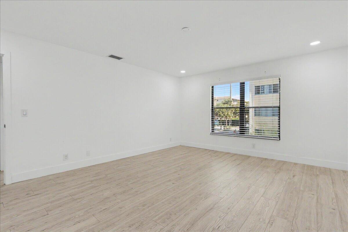 201 Southwest 1st Street, Unit 9 Boca Raton, FL 33432 - Photo 19 of 38 Primary Bedroom