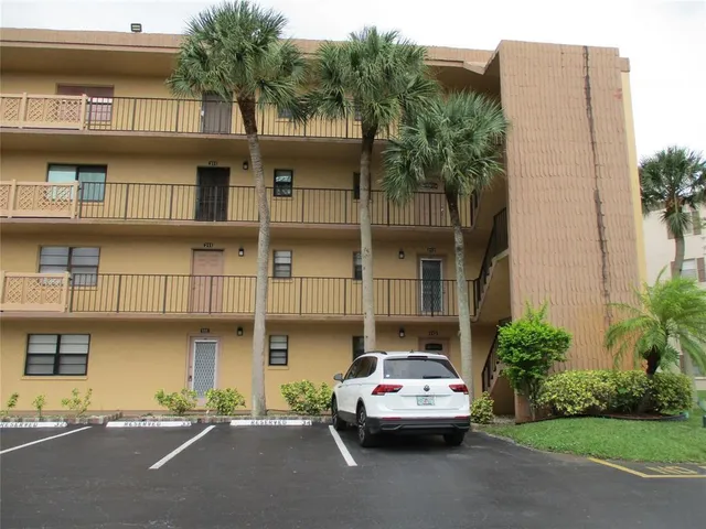 a car parked in front of a building