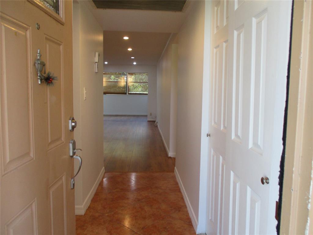 9370 Southwest 8th Street, Unit 312 312 Boca Raton, FL 33428 - Photo 16 of 41 a view of a hallway