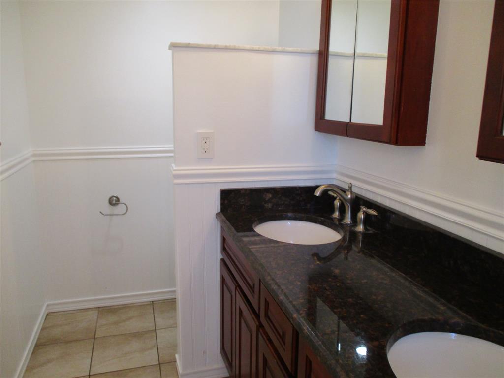 9370 Southwest 8th Street, Unit 312 312 Boca Raton, FL 33428 - Photo 29 of 41 a bathroom with a sink and a toilet