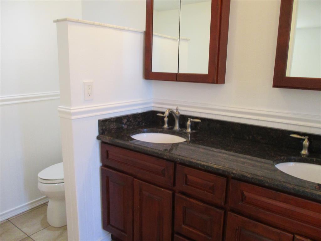 9370 Southwest 8th Street, Unit 312 312 Boca Raton, FL 33428 - Photo 30 of 41 a bathroom with a sink and a toilet