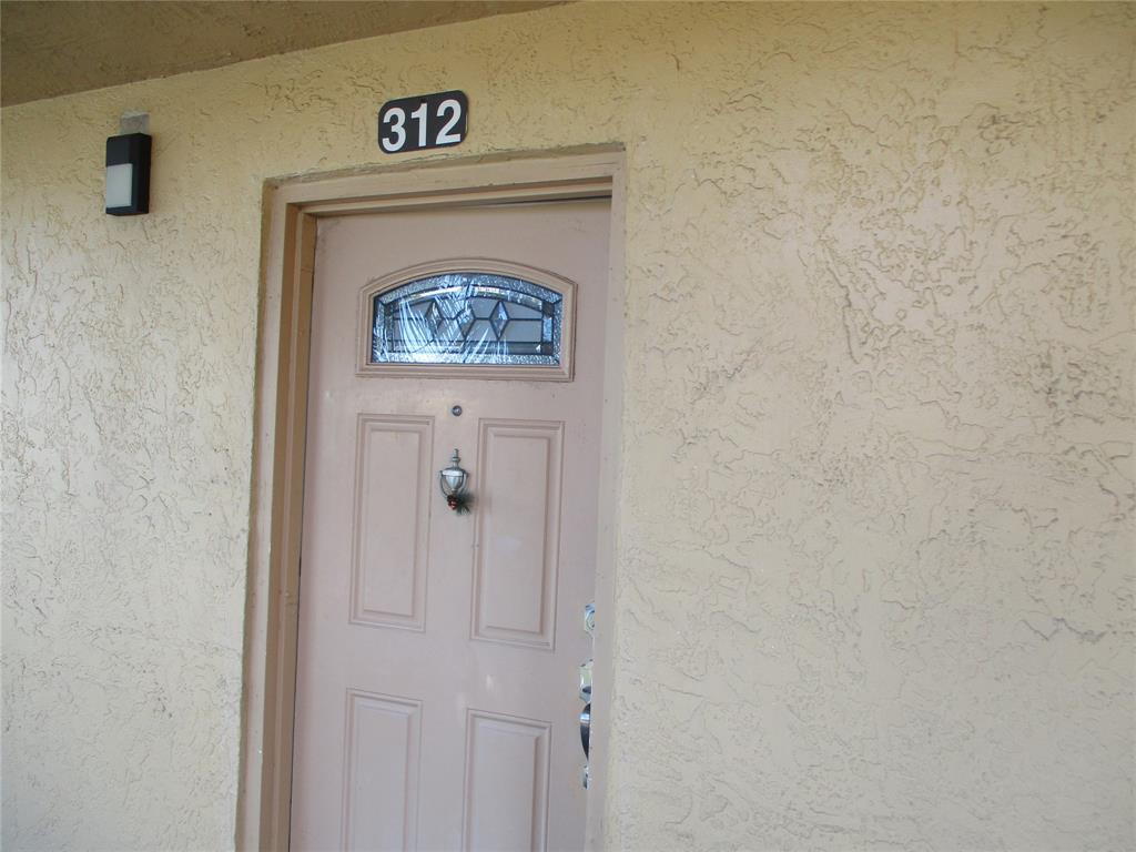 9370 Southwest 8th Street, Unit 312 312 Boca Raton, FL 33428 - Photo 41 of 41 a view of hallway with a hallway